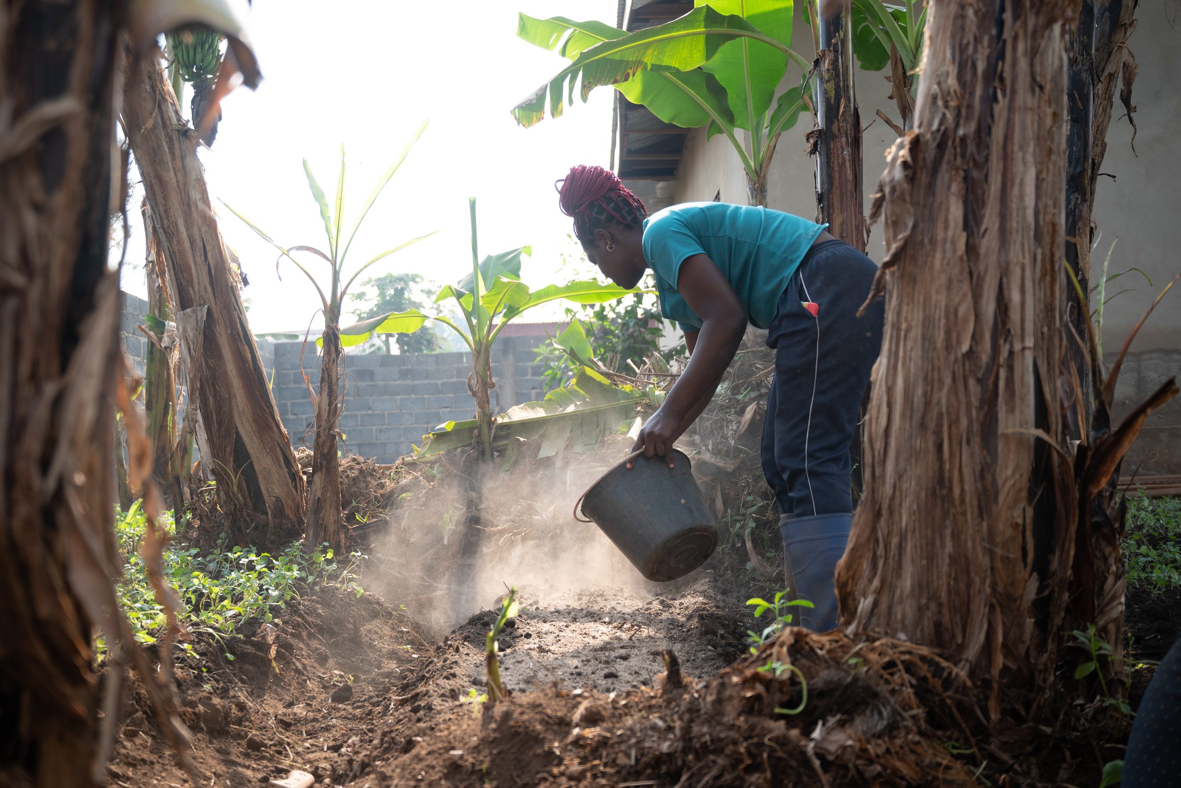 A farmer in West Cameroon working the land — the human endpoint of a fertilizer supply chain that originates at Hormuz