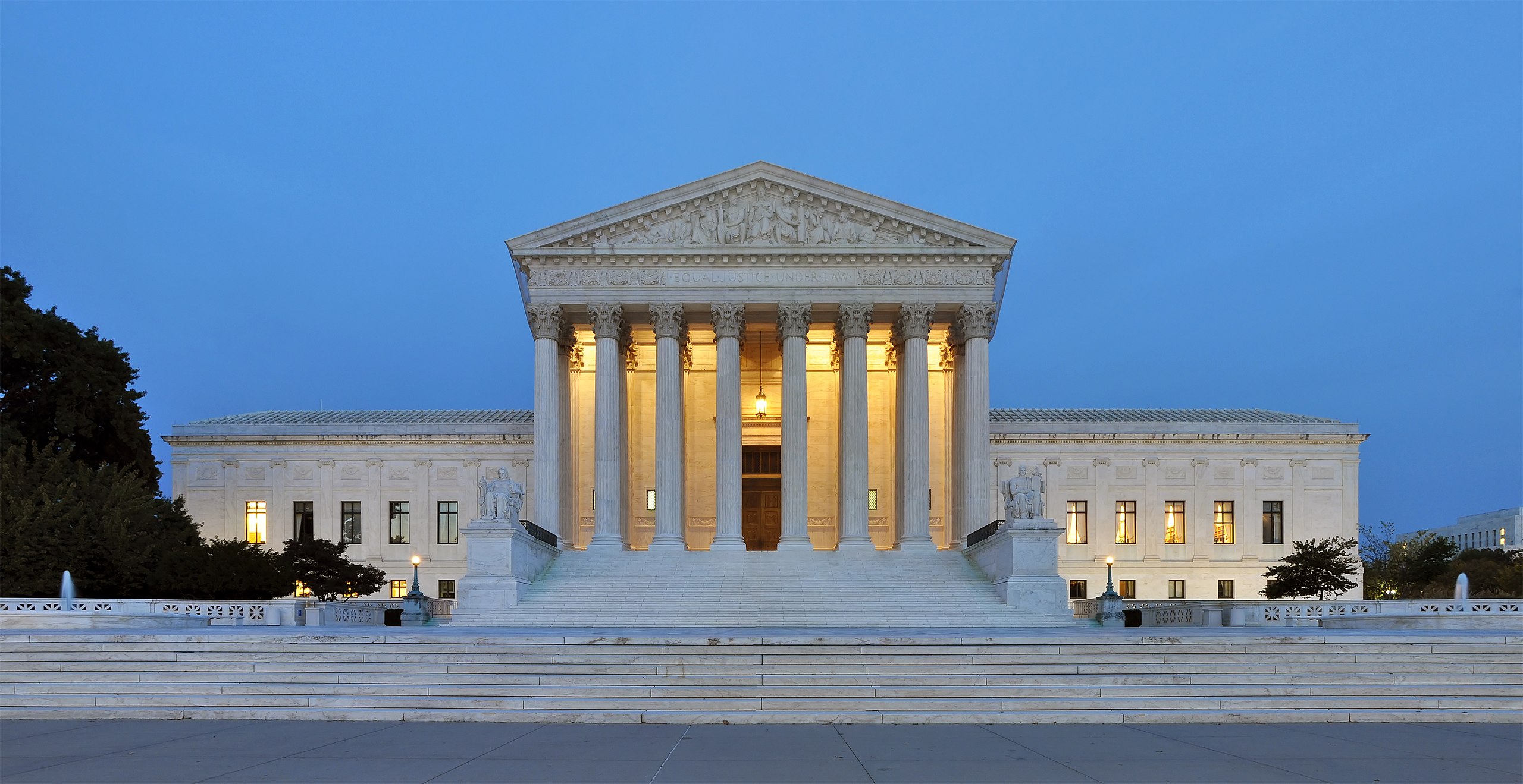 The United States Supreme Court Building at dusk — institutional symbol of legal jurisdiction